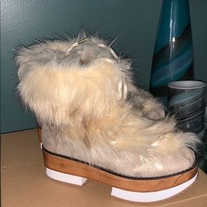 Woman’s faux fur lace up boot